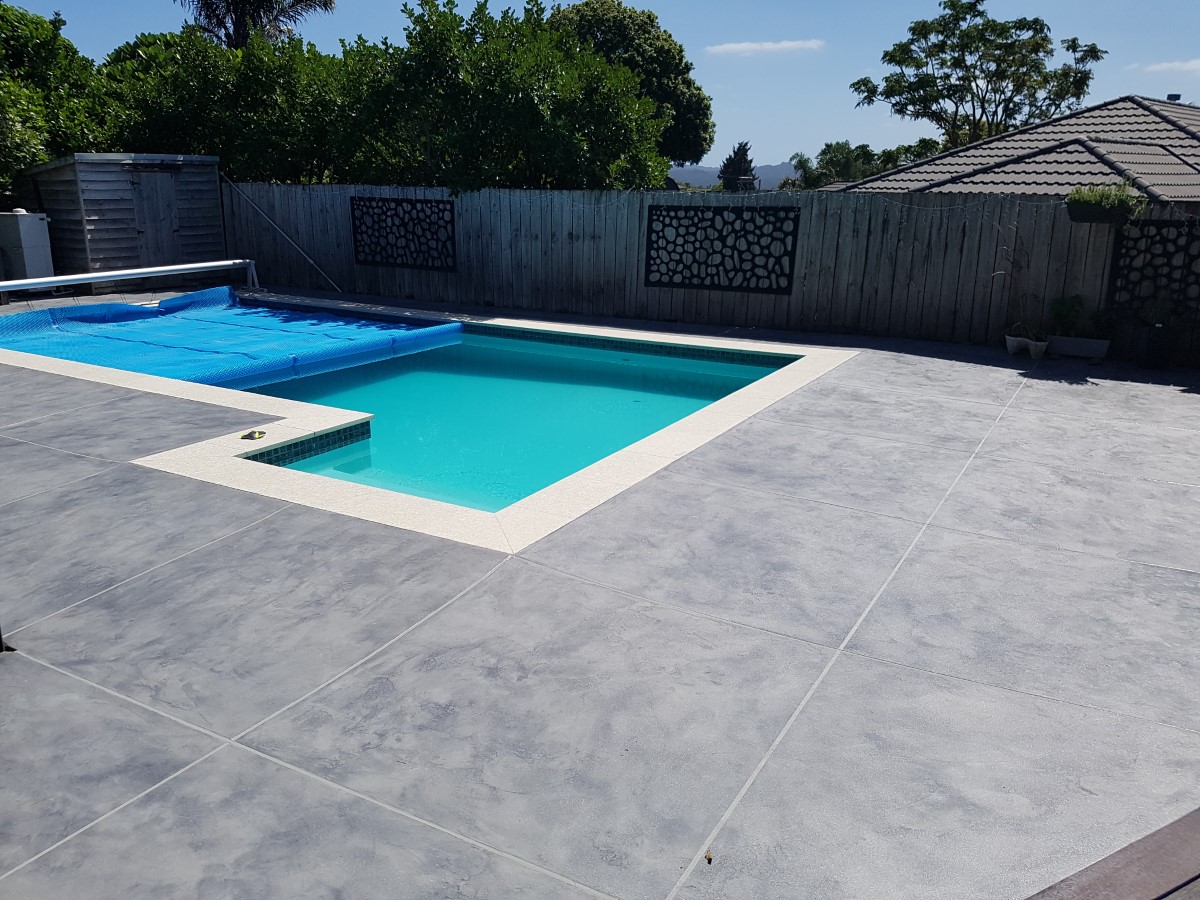 Decorative overlay swimming pool surround